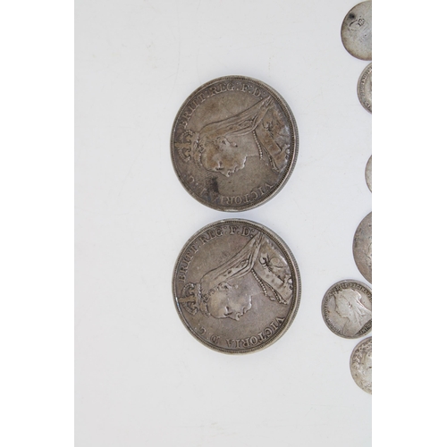 491 - Two Victorian silver crowns 1889 & 1891 together with eleven silver threepenny coins and two silver ... 