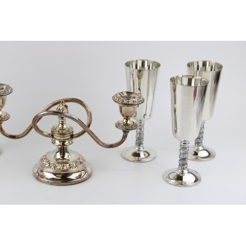 511 - A set of six silver plated goblets with floral engraved wrythen stems by Angulo of Spain, together w... 