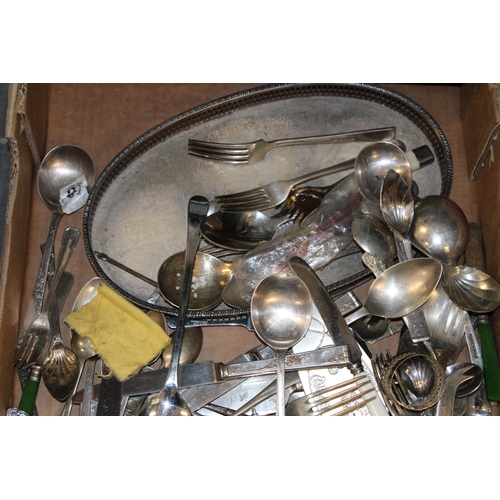 512 - A collection of silver-plated items to include tray, sugar bowl and cream and a quantity of flatware... 