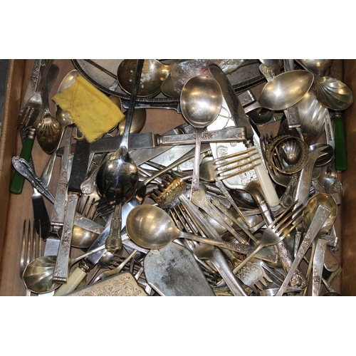 512 - A collection of silver-plated items to include tray, sugar bowl and cream and a quantity of flatware... 