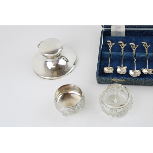 515 - A collection of silver items to include an inkwell hallmarked Birmingham  1947, original liner a/f, ... 