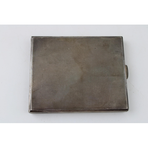 517 - A silver cigarette case with engine turned marked .925. Weight 114g.