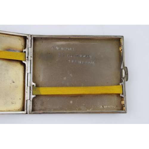 517 - A silver cigarette case with engine turned marked .925. Weight 114g.