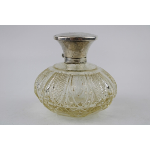 520 - Silver perfume bottle, Birmingham 1924, H&M Ltd, with stopper, 10cm tall.