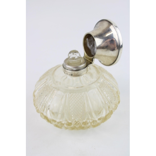 520 - Silver perfume bottle, Birmingham 1924, H&M Ltd, with stopper, 10cm tall.