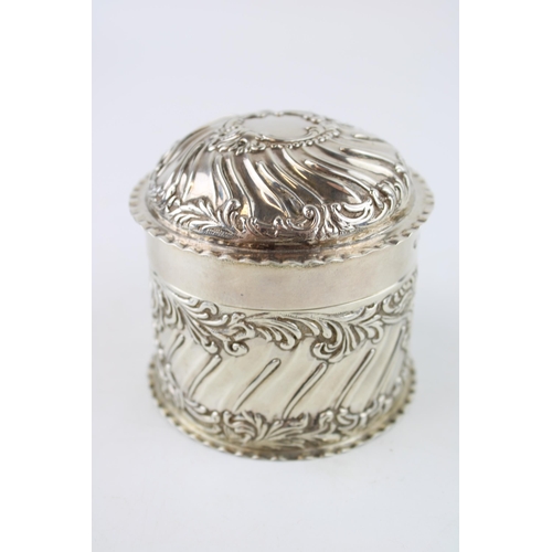 526 - Silver tea caddy, repousse decoration, London 1899, Goldsmiths & Silversmiths, 144.0g, 8cm tall.