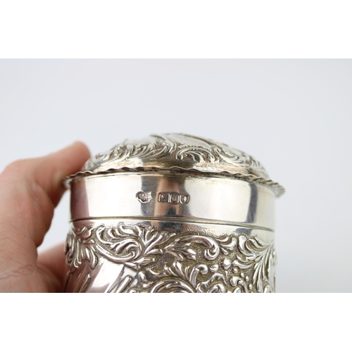 526 - Silver tea caddy, repousse decoration, London 1899, Goldsmiths & Silversmiths, 144.0g, 8cm tall.