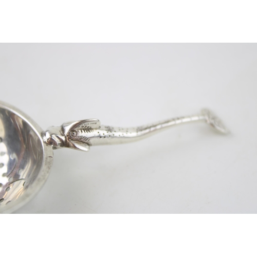 534 - Silver 'Traptrain'  tea strainer, Edinburgh 1934, Broome & Son, 32.9g.