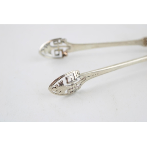 536 - Silver ornate tongs, Sheffield 1876, J Rhodes, 32.7g, 14cm long.