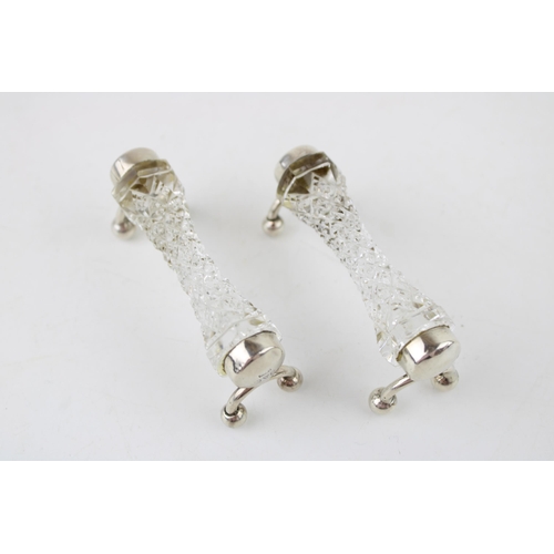 540 - A pair of silver and glass knife rests, Chester 1927, William Vale & Son, raised on ball feet (2), 8... 