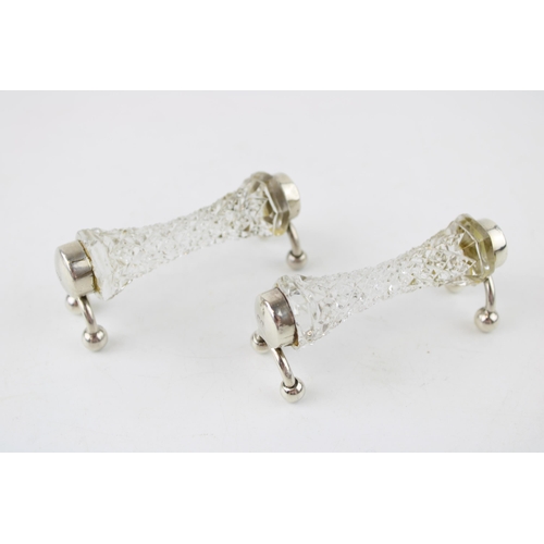 540 - A pair of silver and glass knife rests, Chester 1927, William Vale & Son, raised on ball feet (2), 8... 