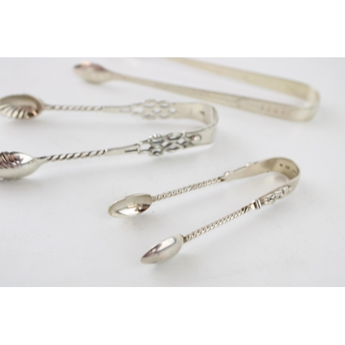 555 - Three pairs of silver sugar tongs to include Birmingham 1888 G Unite, Georgian bright cut tongs, Lon... 