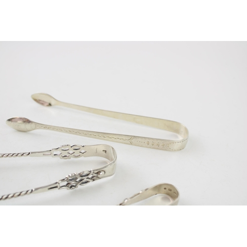 555 - Three pairs of silver sugar tongs to include Birmingham 1888 G Unite, Georgian bright cut tongs, Lon... 