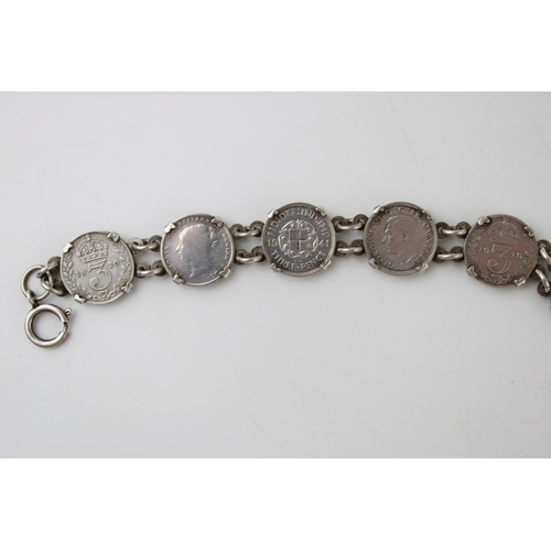 562 - A silver bracelet hallmarked Birmingham set with a collection of silver Threpenny bit coins, all pre... 