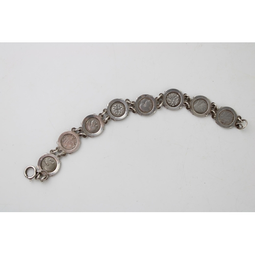 562 - A silver bracelet hallmarked Birmingham set with a collection of silver Threpenny bit coins, all pre... 