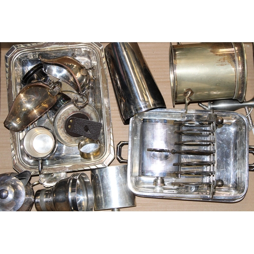 563 - A collection of silver-plated items to include trays, toast rack and other similar items. (Qty)