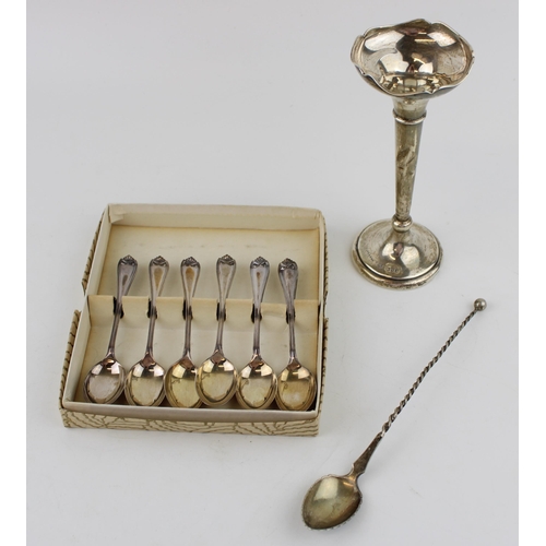 567 - A set of boxed silver spoons (60g) together with a silver spoon marked .830 (weight 12g) together wi... 