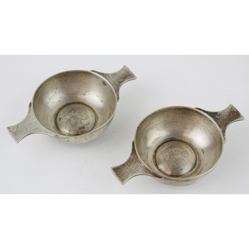 572 - A silver quaich, together with a similar one, both Sheffield 1909, 161.3g, 11cm wide (2).