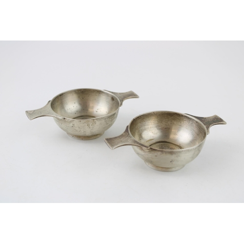 572 - A silver quaich, together with a similar one, both Sheffield 1909, 161.3g, 11cm wide (2).