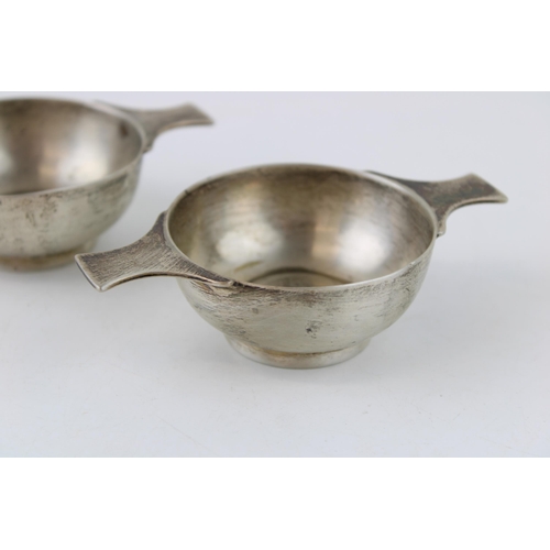 572 - A silver quaich, together with a similar one, both Sheffield 1909, 161.3g, 11cm wide (2).