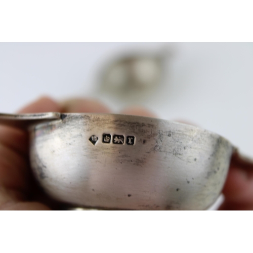 572 - A silver quaich, together with a similar one, both Sheffield 1909, 161.3g, 11cm wide (2).