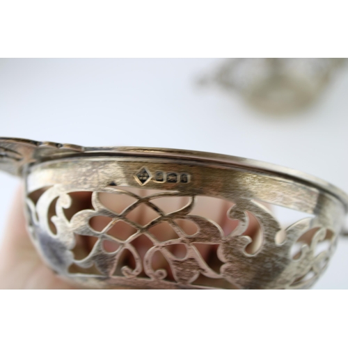 573 - A pair of silver sweet dishes, in the form of a quaich, 313.8g, Sheffield 1908, 19cm wide.