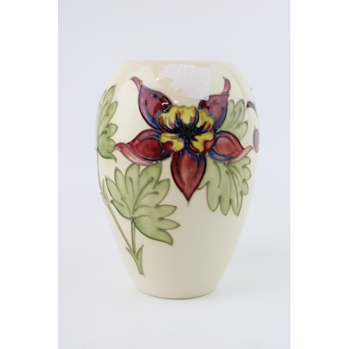 58 - Moorcroft Clematis on magnolia vase, first quality, 18cm tall.