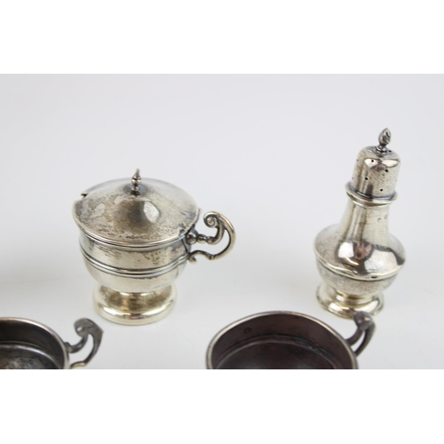 586 - A collection of antique silver items to include salts and peppers. Hallmarked Chester and Birmingham... 