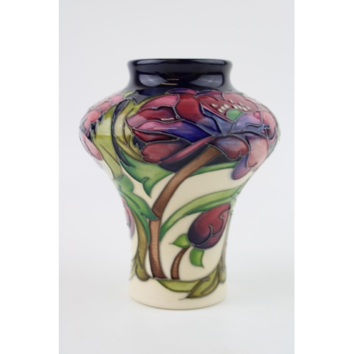 59 - Moorcroft high shouldered trial vase, floral design, first quality, 14cm tall.