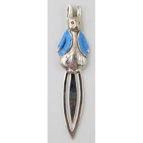 591 - Contemporary sterling silver bookmark of Peter Rabbit, blue enamel coat, 7.5cm long.