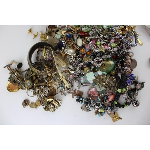 620 - Costume jewellery to include cufflinks, spare stones, necklaces, bracelets and others with odd coins... 