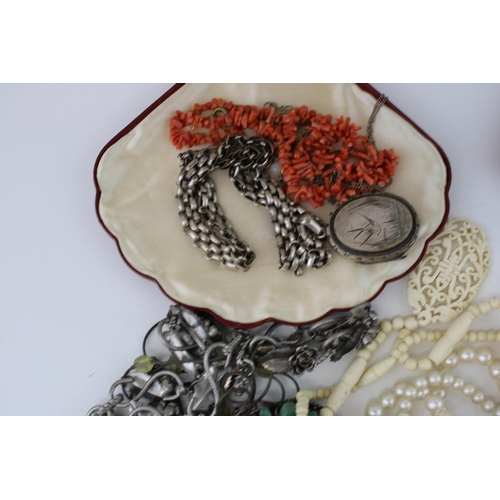 624 - Costume jewellery to include necklaces, a silver plated bird locket with necklace, a hand mirror, fa... 