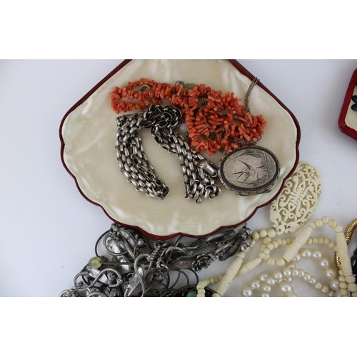 624 - Costume jewellery to include necklaces, a silver plated bird locket with necklace, a hand mirror, fa... 