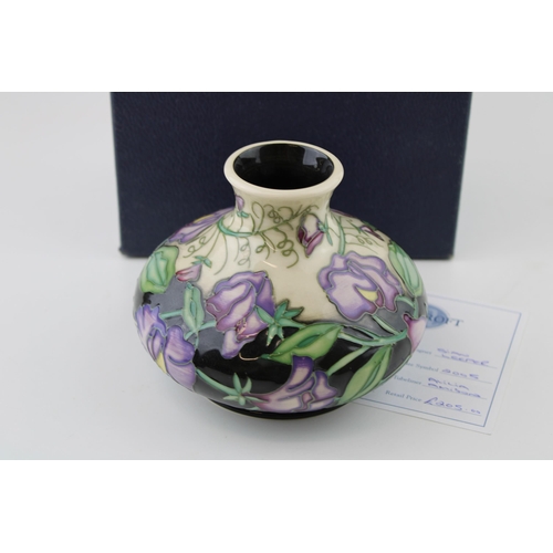 63 - Boxed Moorcroft squat vase in the 'Daydream' pattern, first quality, 13cm wide, shape 32/5, Sian Lee... 