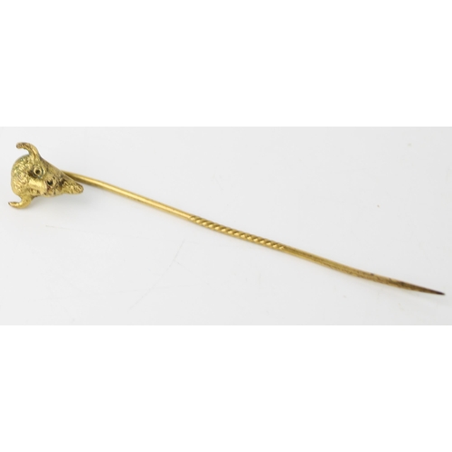 632 - Edwardian gold plated stick pin in the form of a buffalo's head, possibly masonic, 6.5cm long.