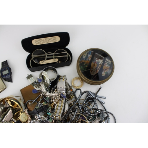 633 - A mixed collection of costume jewellery, watches, penknives cigarette cases and similar items. (Qty)