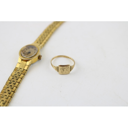 634 - A 9ct gold signet ring (weight 1.8grams) together with a vintage cocktail watch. (2)