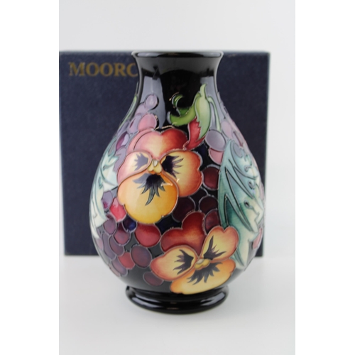 64 - Boxed Moorcroft painting master in 'A Fruit Feast' pattern, first quality, 20cm tall.