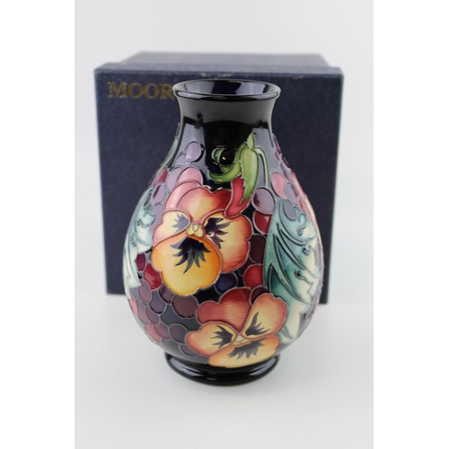 64 - Boxed Moorcroft painting master in 'A Fruit Feast' pattern, first quality, 20cm tall.