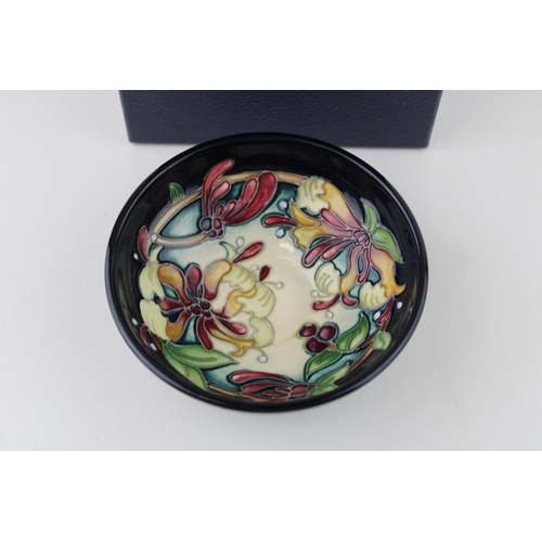 66 - Boxed Moorcroft Honeysuckle Haven bowl, first quality, 12cm diameter.