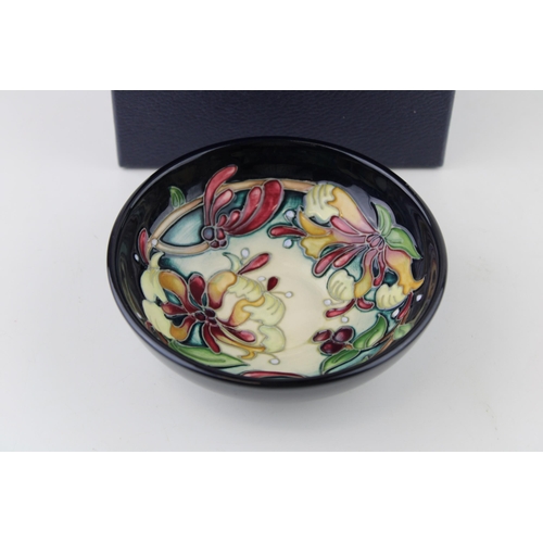 66 - Boxed Moorcroft Honeysuckle Haven bowl, first quality, 12cm diameter.