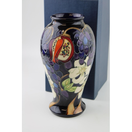 68 - Boxed Moorcroft large baluster vase, decorated with grapes and flowers, first quality, 25.5cm tall.