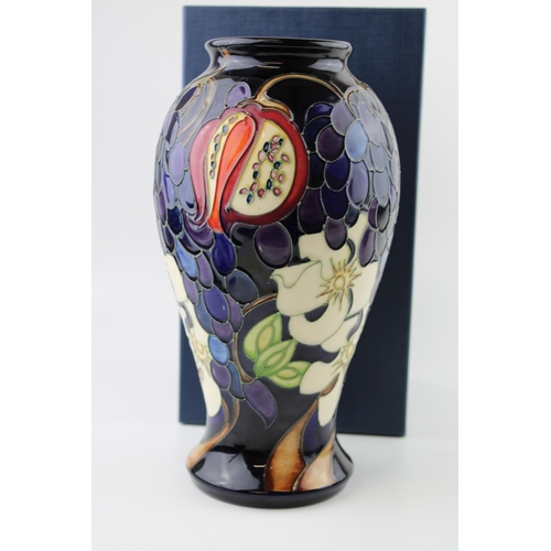 68 - Boxed Moorcroft large baluster vase, decorated with grapes and flowers, first quality, 25.5cm tall.