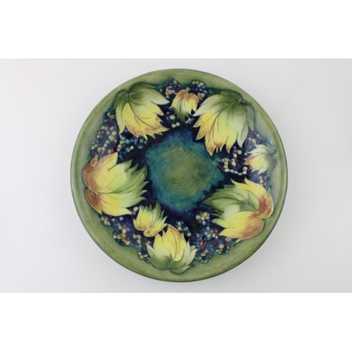 72 - Moorcroft Leaf and Berries plate, 22cm diameter.