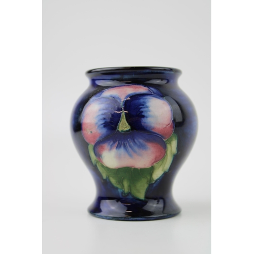 73 - Moorcroft Orchid Vase, baluster form, 8cm tall.