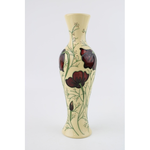 74 - Moorcroft vase in the Chocolate Cosmos design, 21cm tall (repaired chip), red dot