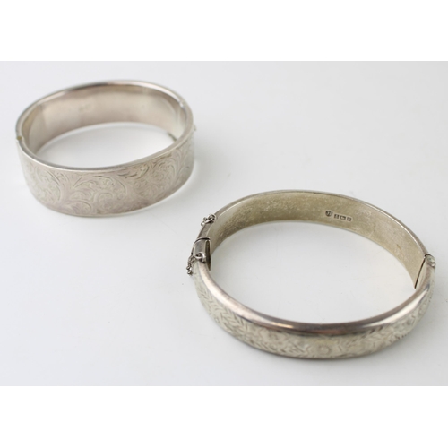 596 - Two hallmarked silver bangles, 45g.