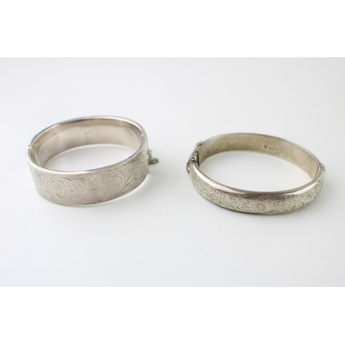 596 - Two hallmarked silver bangles, 45g.