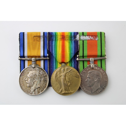 607 - Three medals to include two World War One medals with WW2 Defence Medal, 47073 PTE H ROGERS (3).