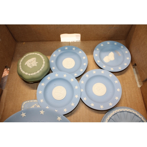 320A - Wedgwood Jasperware, varying colours such as dip blue, green and blue to include a biscuit barrel, t... 